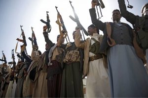 Houthi rebel fighters chant slogans as they hold their weapons during a gathering aimed at mobilizing more fighters for the Iranian-backed Houthi movement, in Sanaa, Yemen, Thursday, Feb. 20, 2020. The Houthi rebels control the capital, Sanaa, and much of the country’s north, where most of the population lives. They are at war with a U.S.-backed, Saudi-led coalition fighting on behalf of the internationally recognized government. (AP Photo/Hani Mohammed)