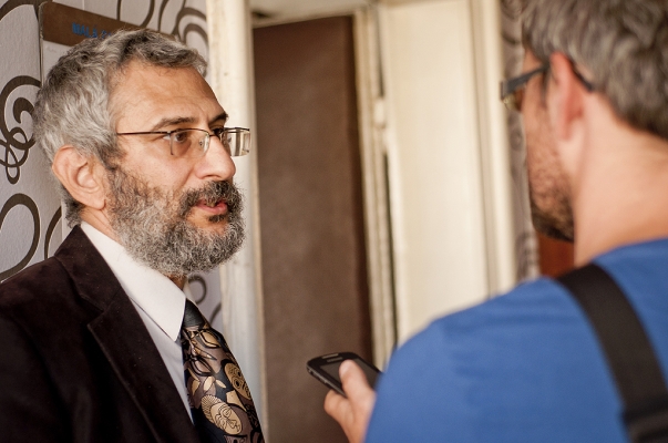 Dr. Grigorij Mesežnikov, president of the Institute for Public Affairs – pictured left – is interviewed at a press conference, held in Bratislava, 17 September 2012, which launched an open letter from 84 Slovak academics calling for an end to the persecution of Baha'i educators and students in Iran.