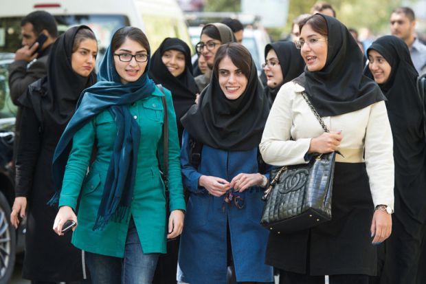 female-students-walking-on-campus-university-of-tehran-iran