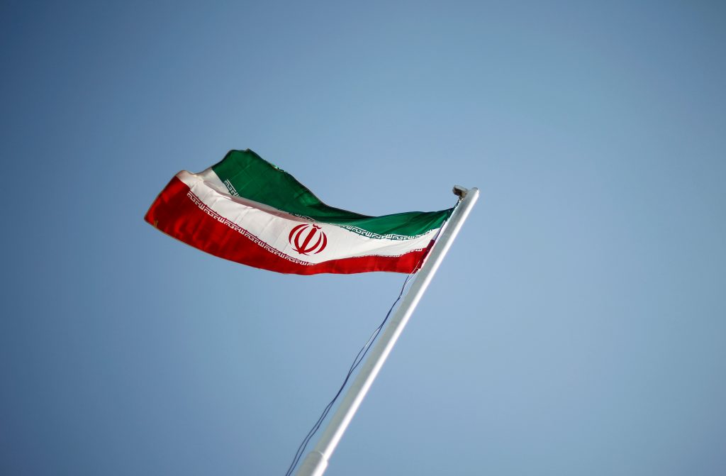 An Iranian national flag flutters during the opening ceremony of the 16th International Oil, Gas & Petrochemical Exhibition (IOGPE) in Tehran, Iran, on April 15, 2011. Photo by STR/File Photo/Reuters