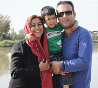 Azita Rafizadeh and her husband Peyman Kooshkebaghi, who both taught computer engineering at BIHE and are now in prison. While their 5-year old son is outside. (Niknaz Aftahi)