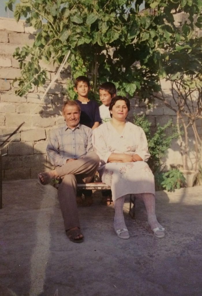 HASEL AFSHAR WITH HIS PARENTS AND BROTHER IN IRAN.