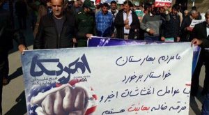 Hours after the arrest of nine Baha'i citizens, a crowd of worshippers at Friday prayers staged a march calling for a crackdown on protesters and Baha’is
