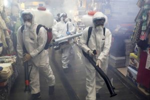 Firefighters disinfect a shopping centre in northern Tehran. Despite a potential second wave of coronavirus infections (new cases have averaged around 2,500 a day since the start of June) a new wave of arrests has targeted at least 77 Bahá’í’s. Picture: Ebrahim Noroozi/AP