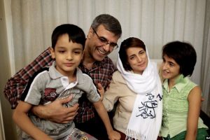 Nasrin Sotoudeh (second from right) poses with her husband, Reza Khandan, her son Nima, and her daughter Mehraveh at her house in Tehran in September 2013.