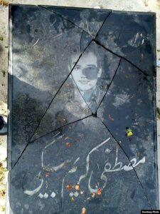 Iran – The destroyed gravestone of Mostafa Karimbeigi. (Courtesy of the family)